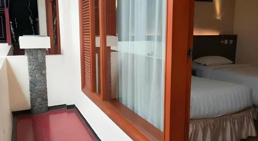 Bed in Purnama Hotel