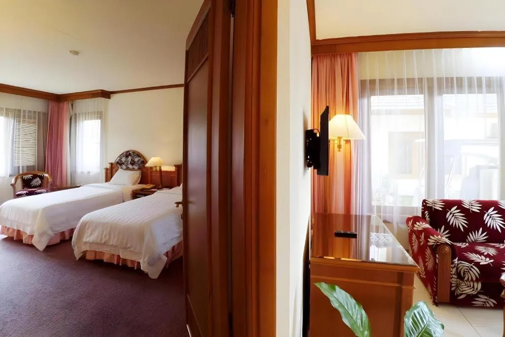 Bed in Purnama Hotel