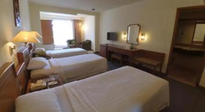 Bed in Purnama Hotel