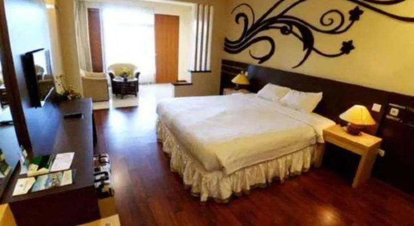 Bed in Purnama Hotel