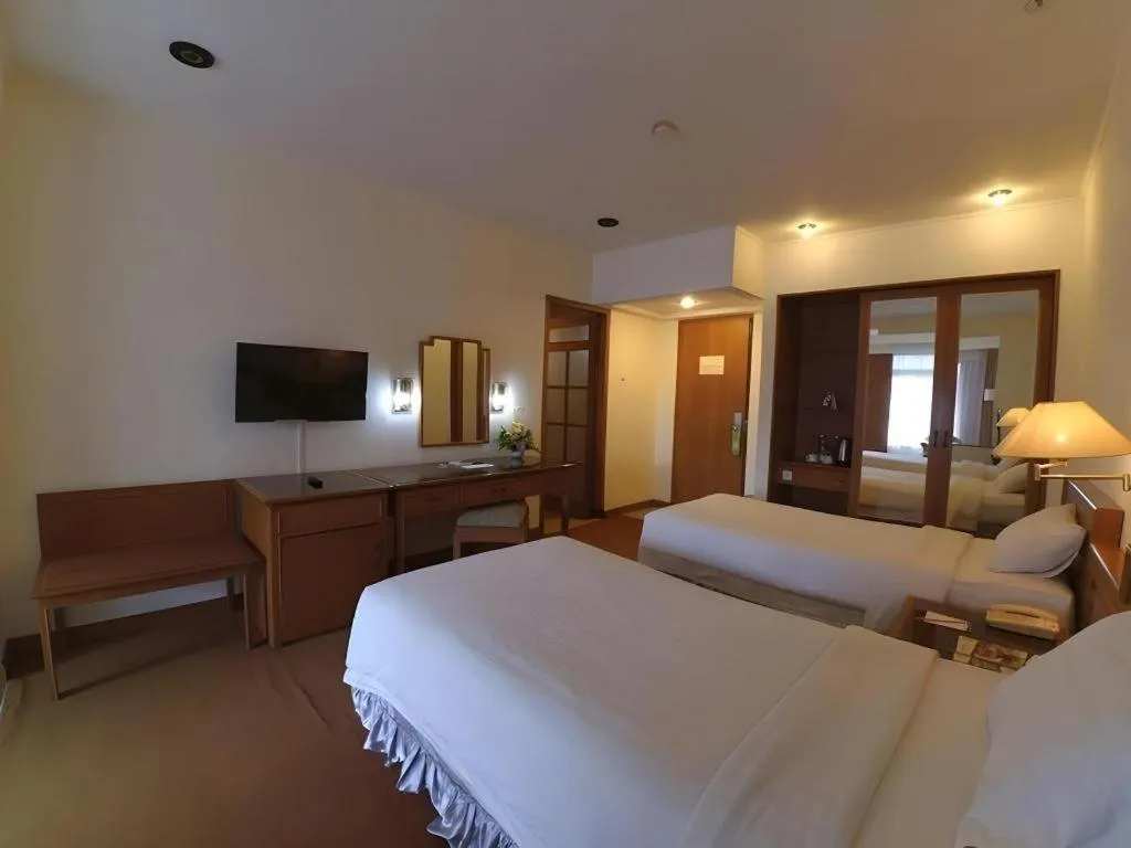 Bed in Purnama Hotel