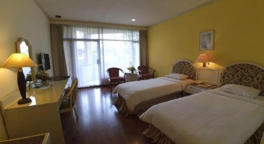 Bed in Purnama Hotel