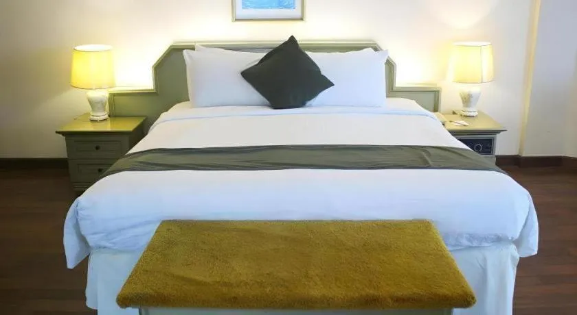 Bed in Purnama Hotel