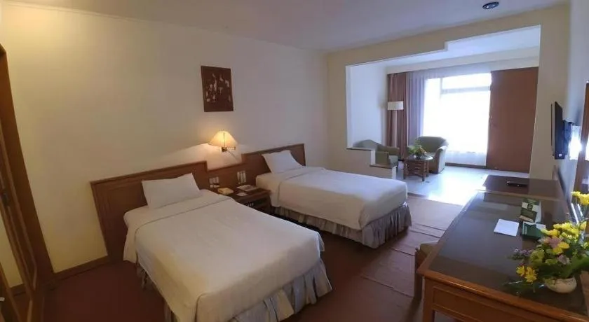 Bed in Purnama Hotel