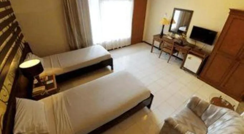 Bed in Purnama Hotel