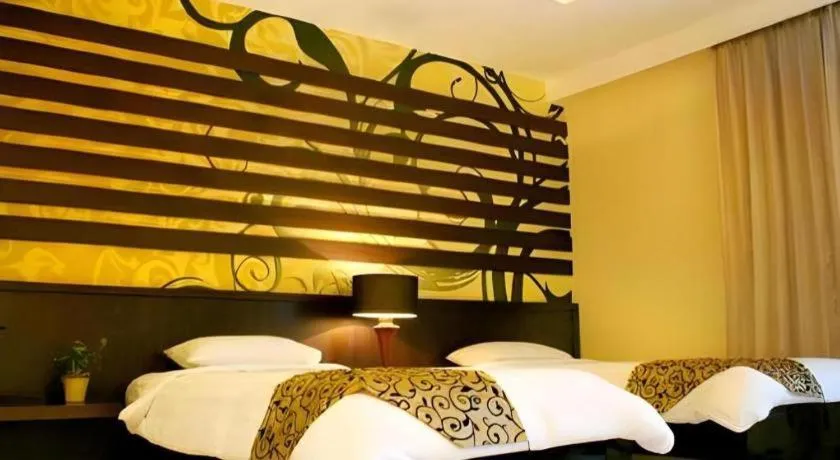 Bed in Purnama Hotel