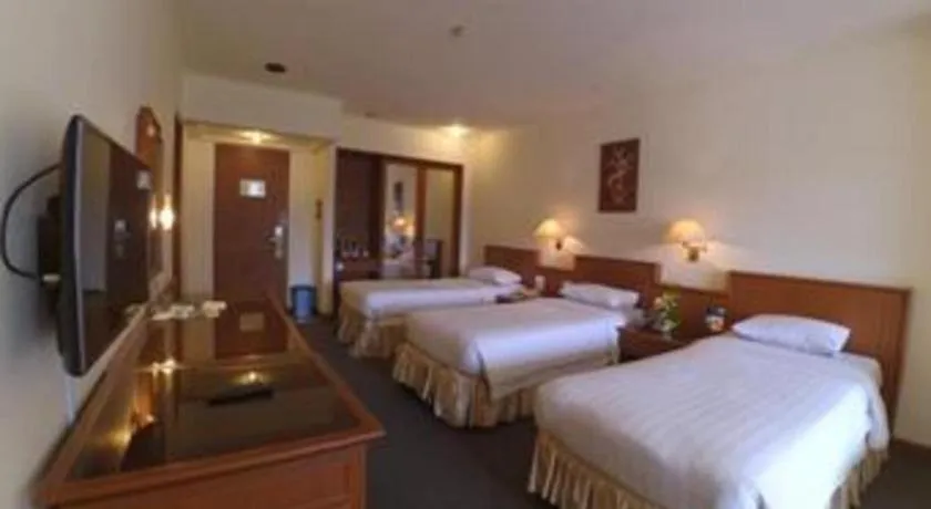 Bed in Purnama Hotel