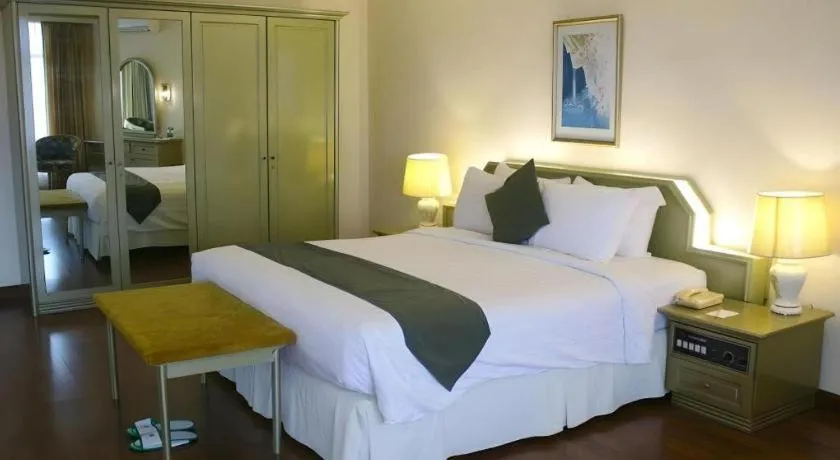 Bed in Purnama Hotel