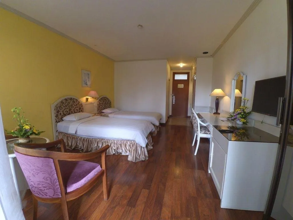 Bed in Purnama Hotel