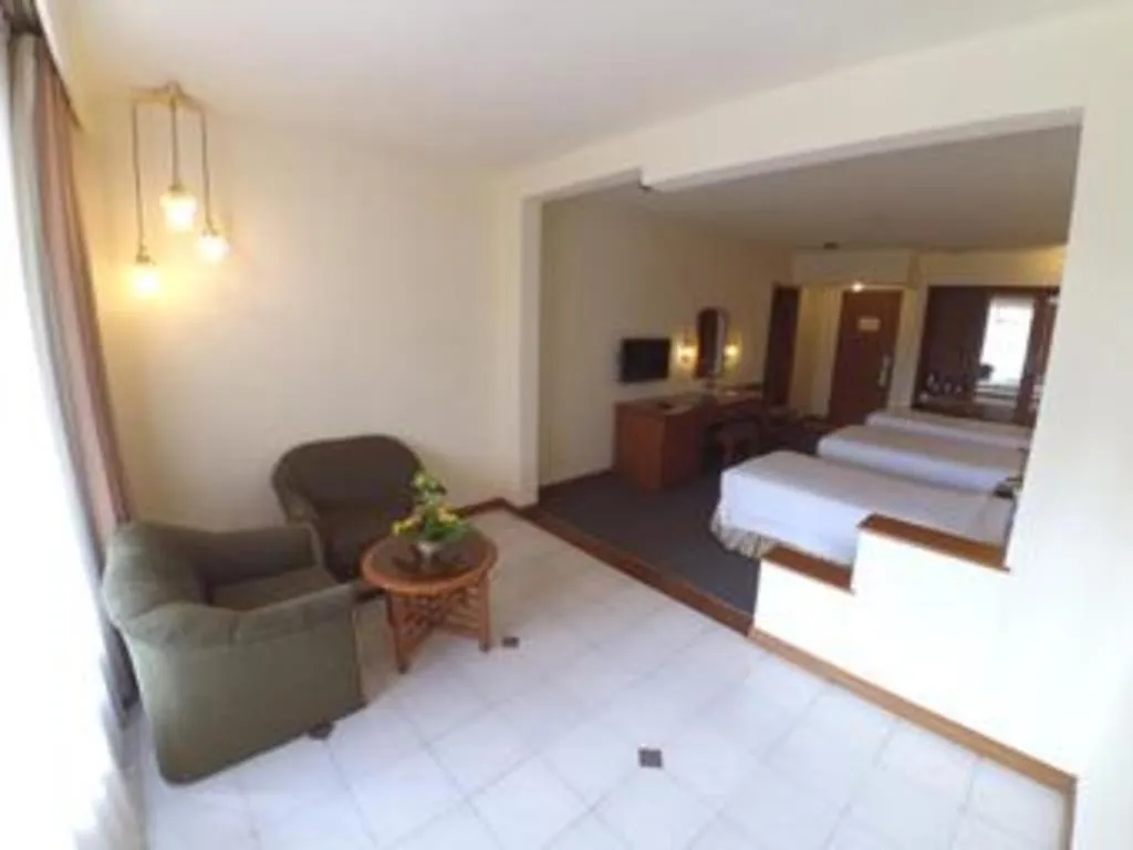 Bed in Purnama Hotel