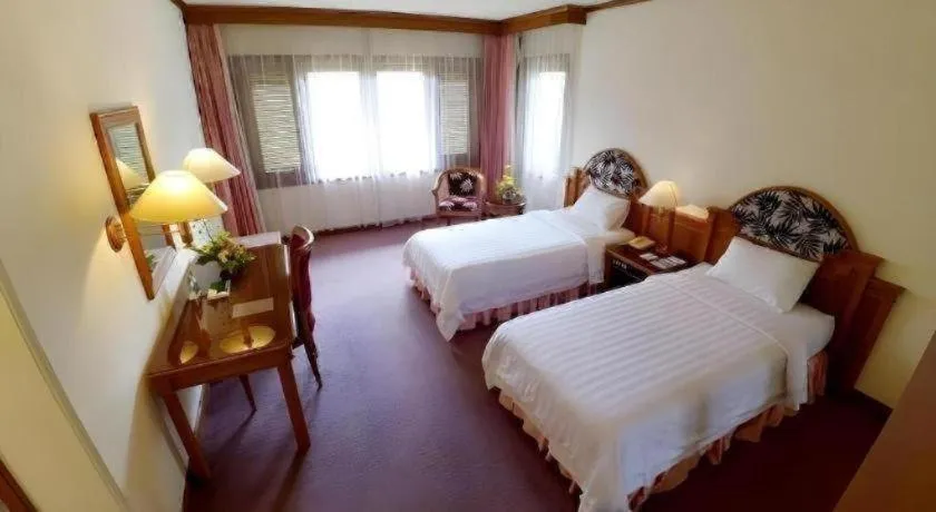 Bed in Purnama Hotel