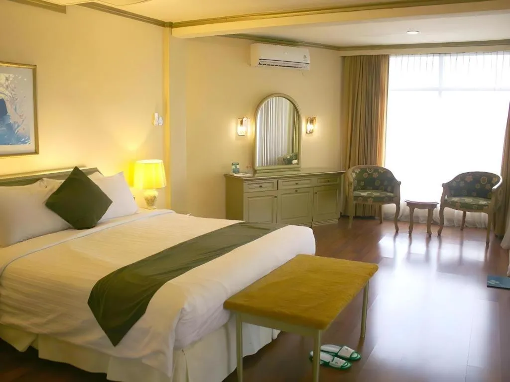 Bed in Purnama Hotel