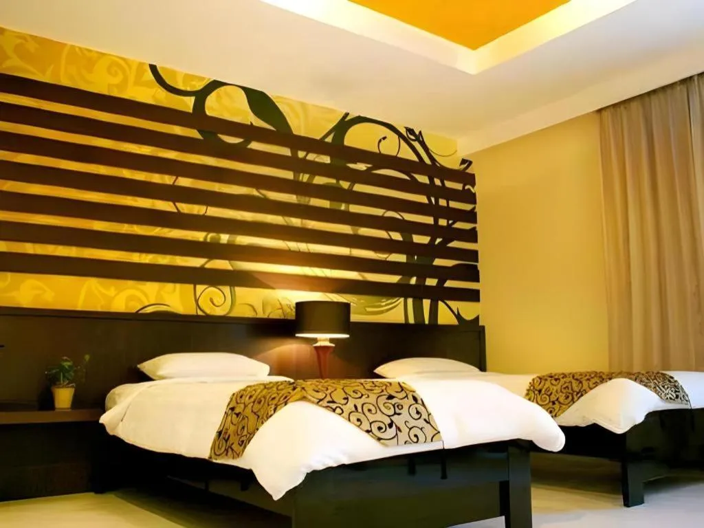 Bed in Purnama Hotel