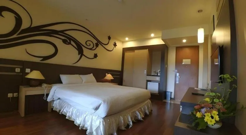 Bed in Purnama Hotel