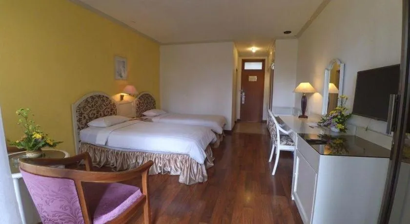 Bed in Purnama Hotel