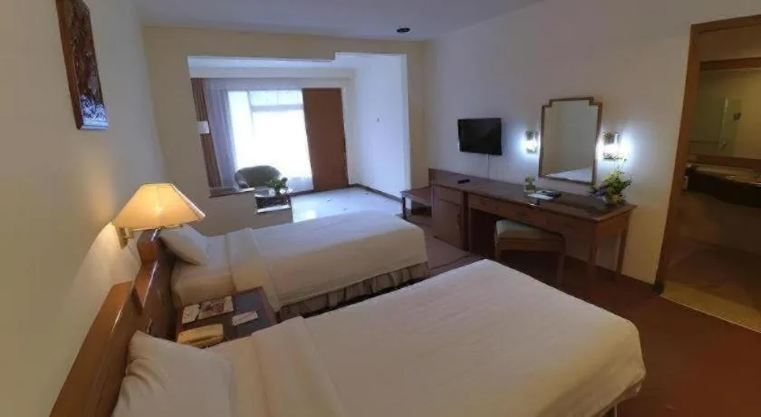 Bed in Purnama Hotel