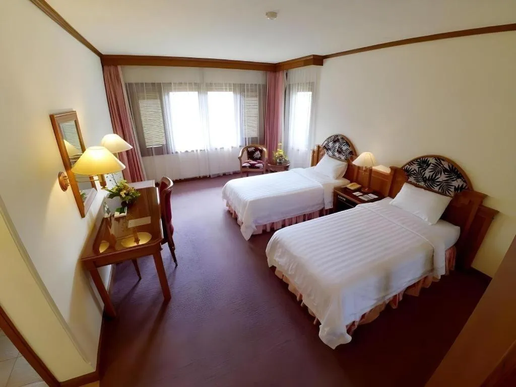 Bed in Purnama Hotel