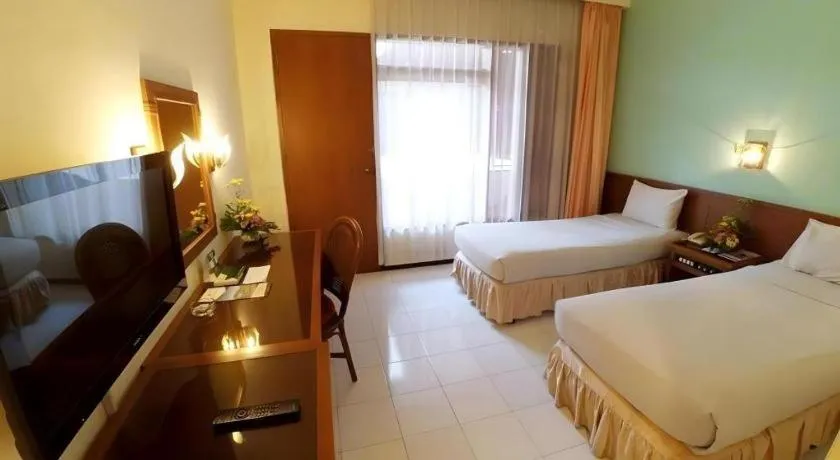 Bed in Purnama Hotel