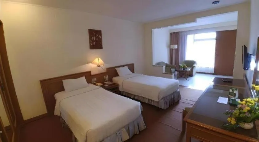 Bed in Purnama Hotel