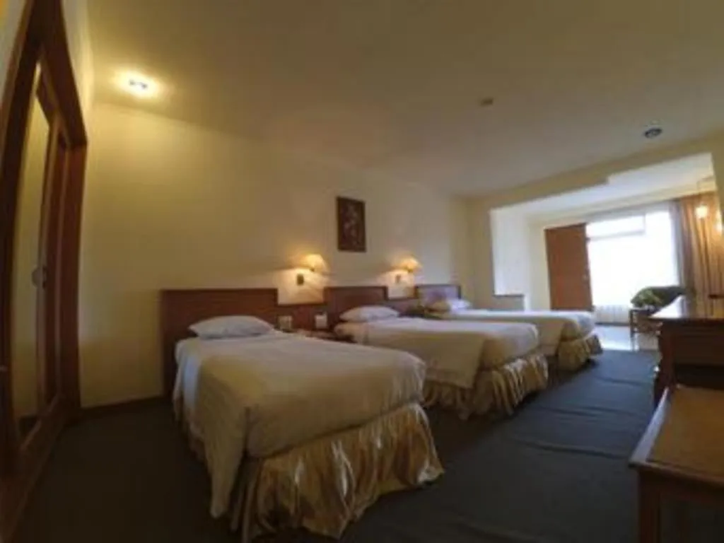 Bed in Purnama Hotel