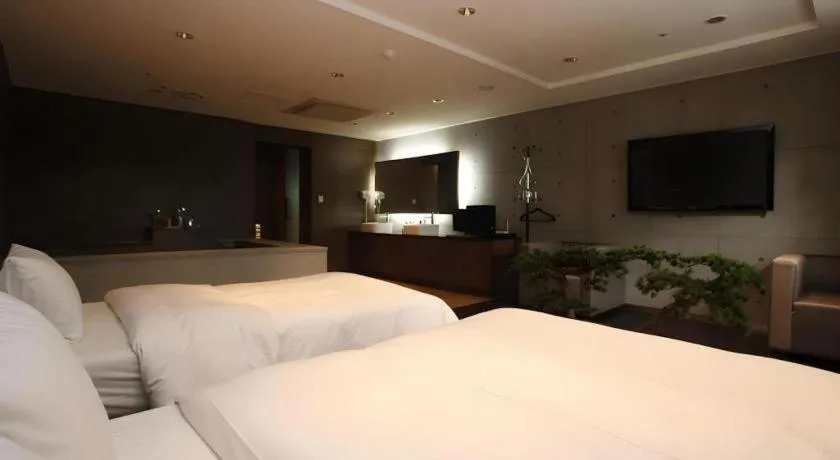 Bed in Nox Boutique Hotel