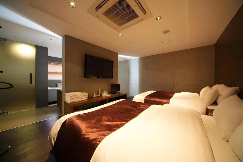 Bed in Nox Boutique Hotel