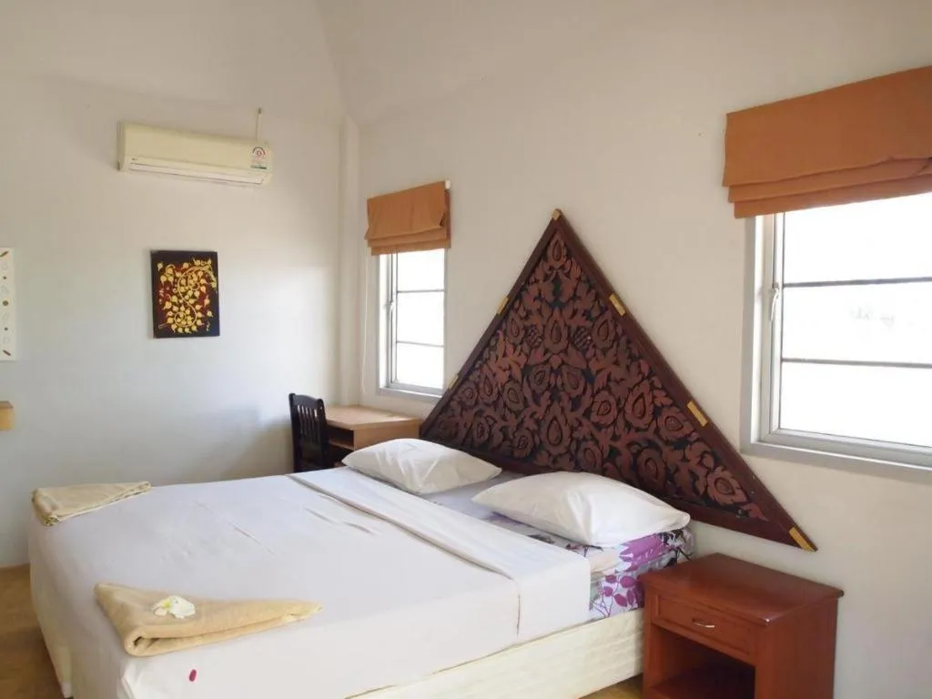 Bed in Jinta Beach Bungalow
