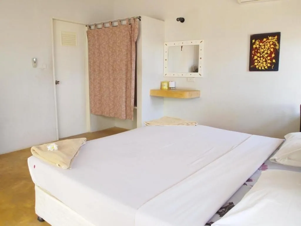 Bed in Jinta Beach Bungalow