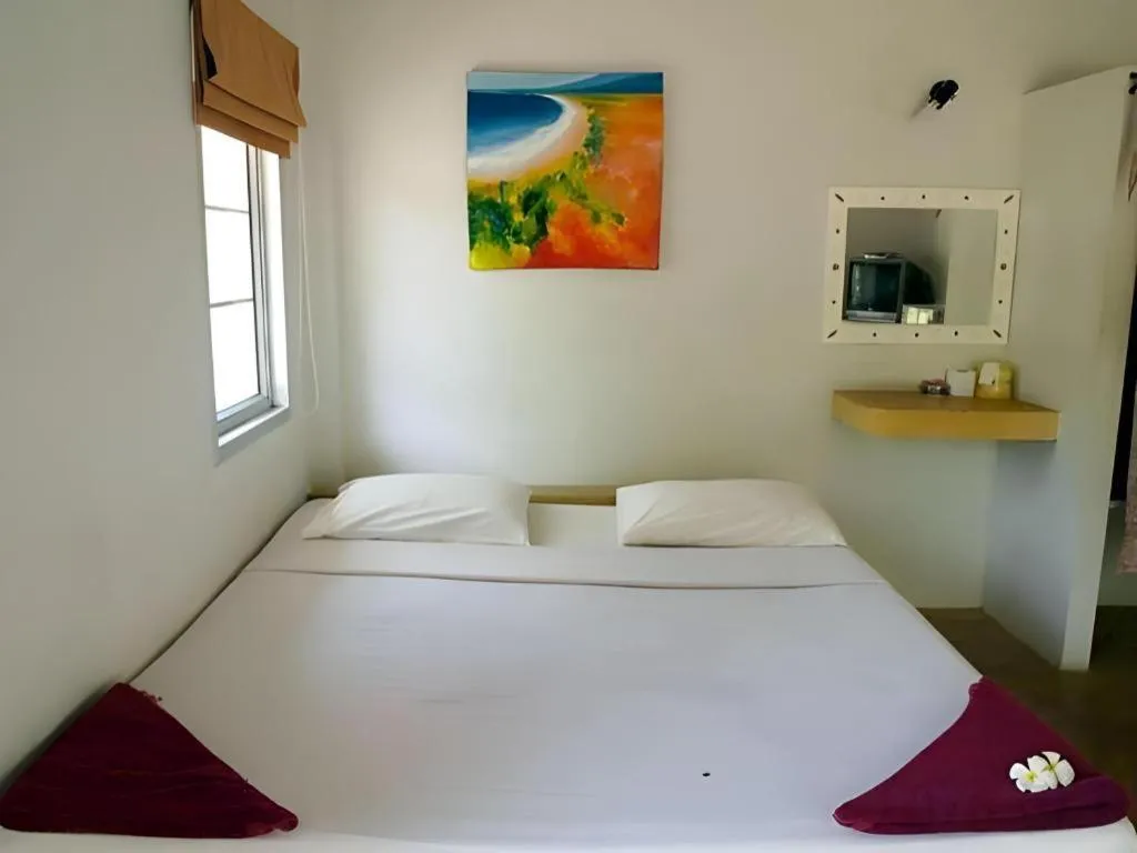 Bed in Jinta Beach Bungalow