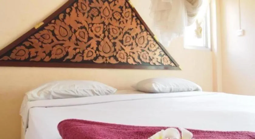 Bed in Jinta Beach Bungalow