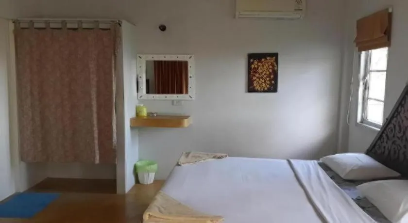 Bed in Jinta Beach Bungalow