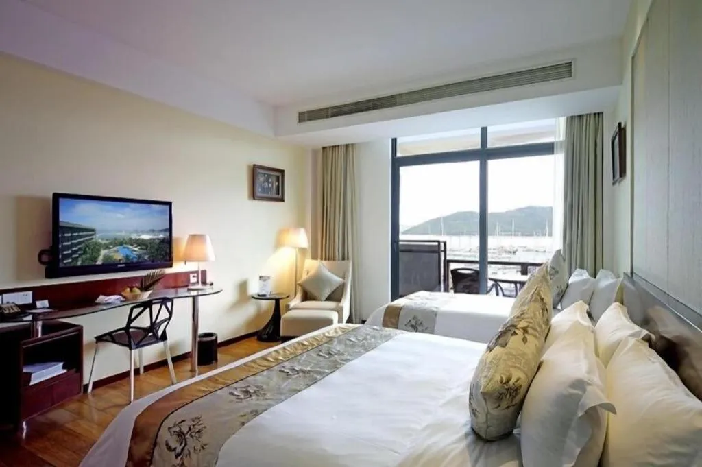 Bed in Serenity Marina Hotel