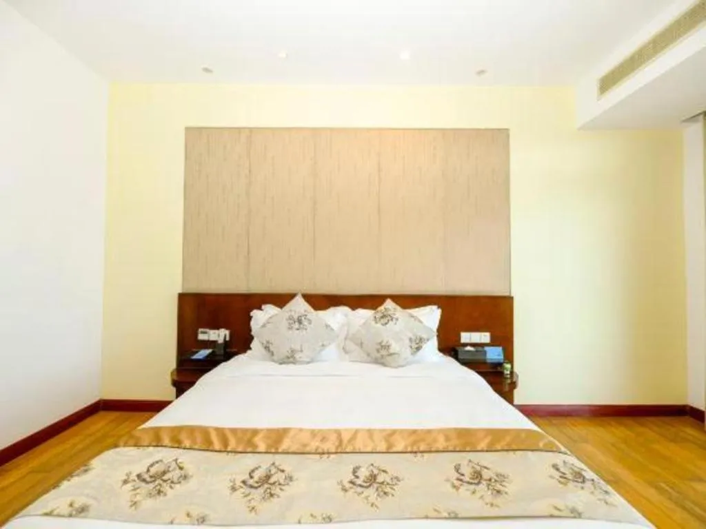 Bed in Serenity Marina Hotel