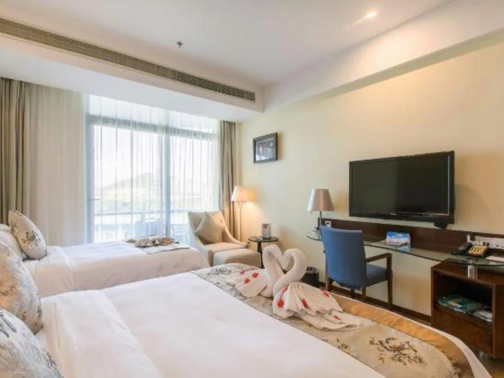 Bed in Serenity Marina Hotel