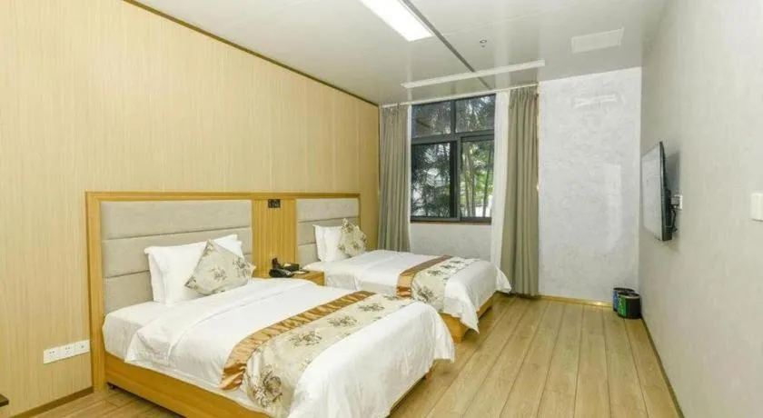 Bed in Serenity Marina Hotel