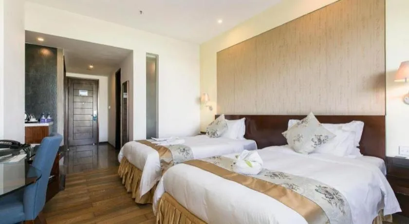 Bed in Serenity Marina Hotel