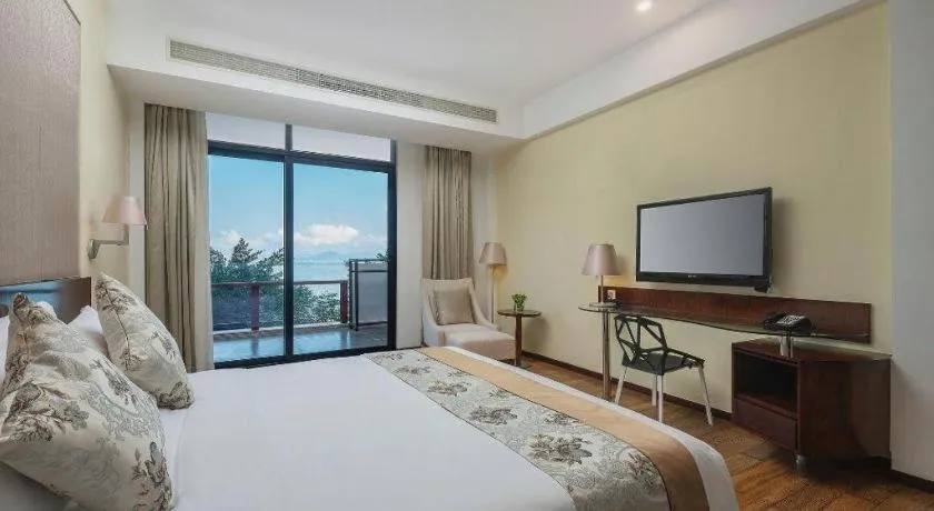 Bed in Serenity Marina Hotel