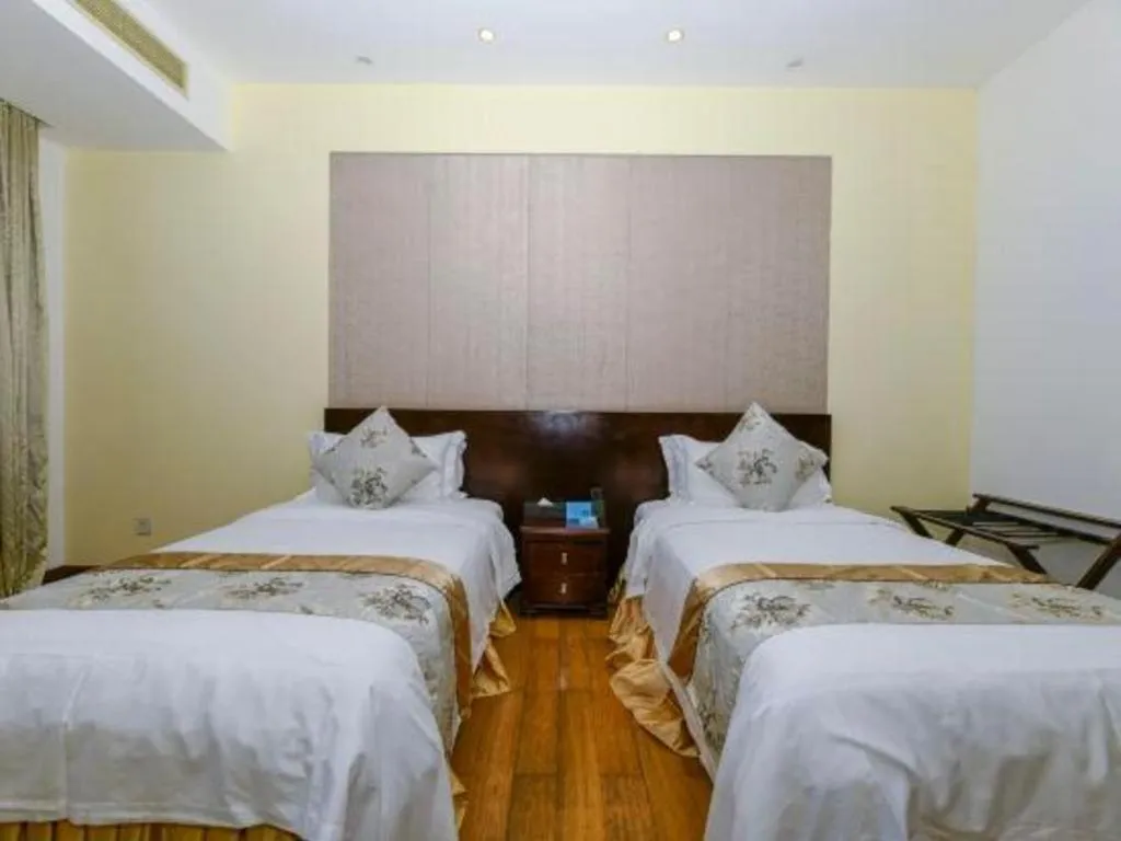 Bed in Serenity Marina Hotel