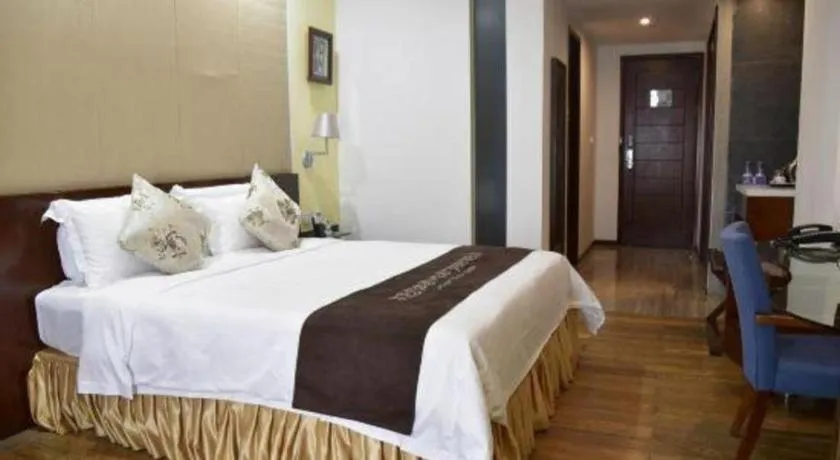 Bed in Serenity Marina Hotel