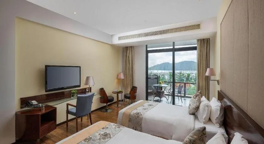 Bed in Serenity Marina Hotel