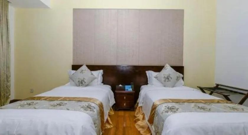 Bed in Serenity Marina Hotel