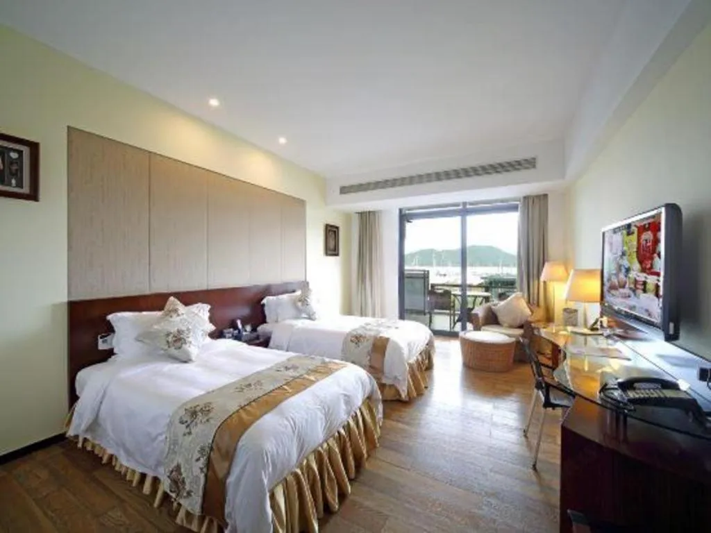 Bed in Serenity Marina Hotel