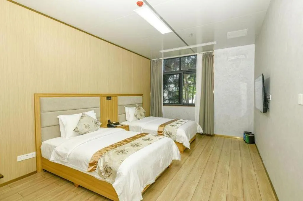 Bed in Serenity Marina Hotel