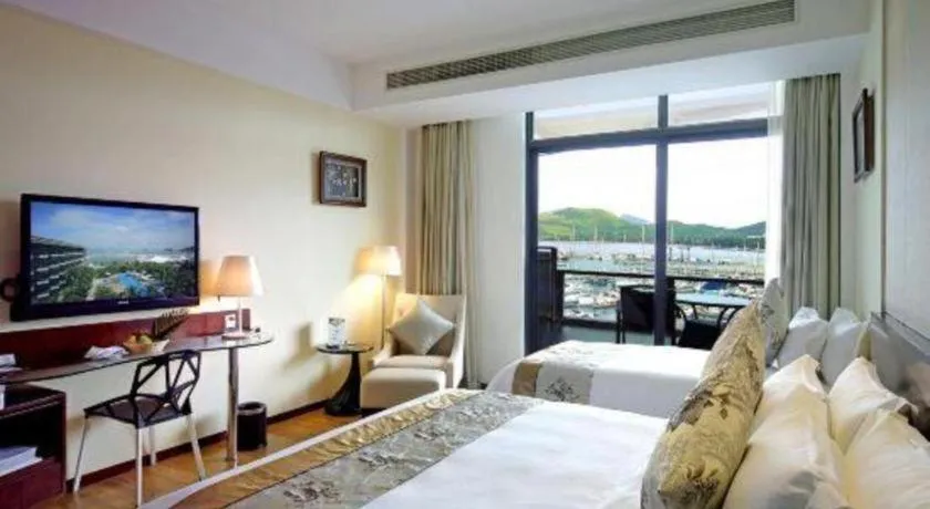 Bed in Serenity Marina Hotel