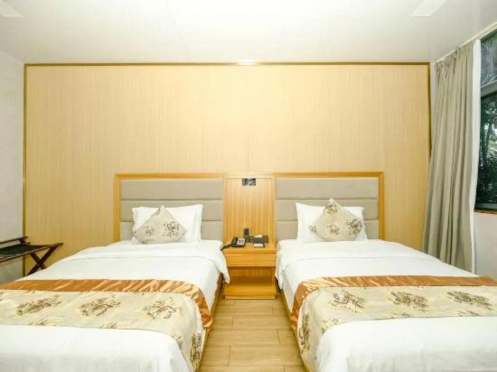 Bed in Serenity Marina Hotel