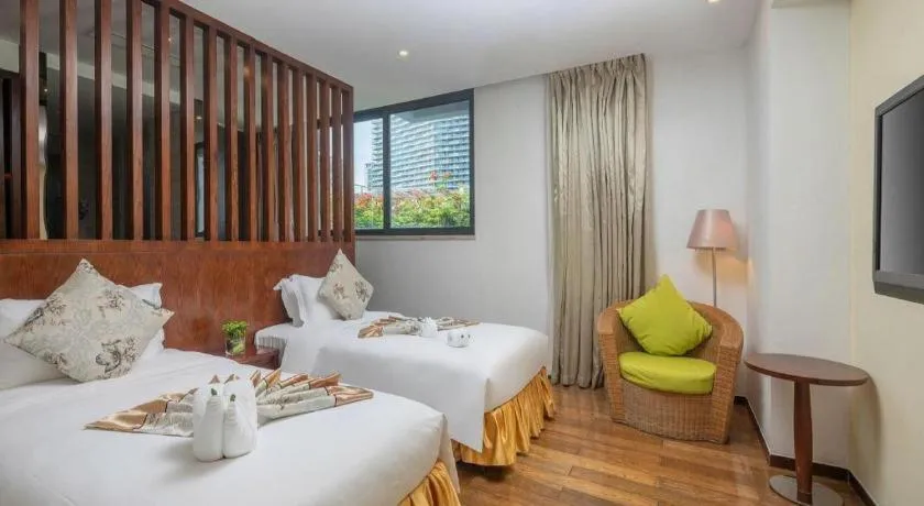 Bed in Serenity Marina Hotel