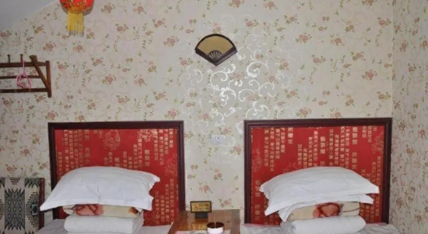 Bed in Pingyao Yufengheng Hotel