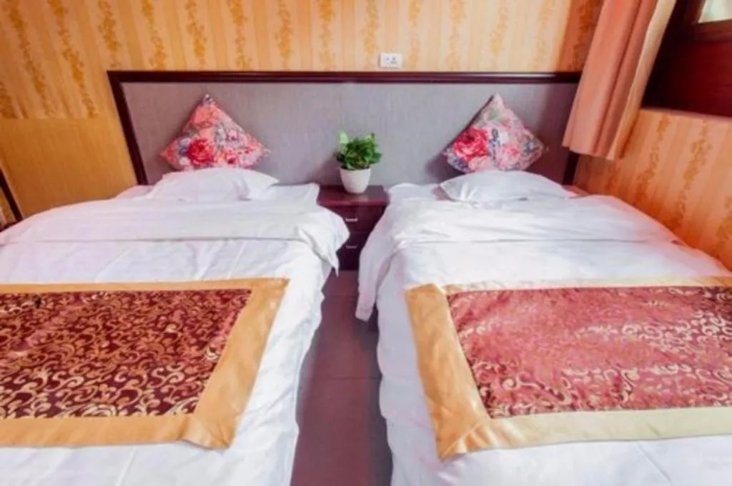 Bed in Pingyao Yufengheng Hotel