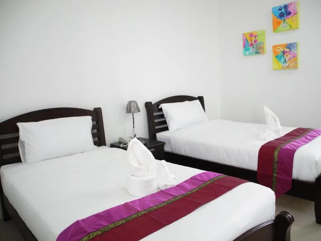 Bed in Phet Cha-am Plaza&Resort