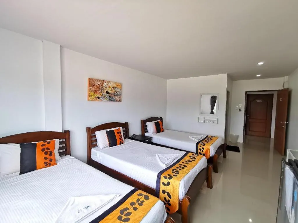 Bed in Phet Cha-am Plaza&Resort